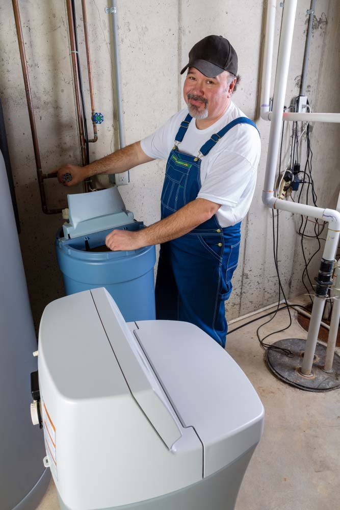plumber installing water softener Austin, TX